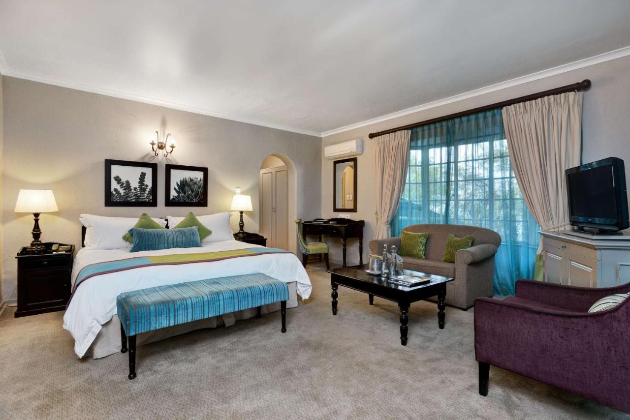 Mount Grace Hotel & Spa Magaliesburg Exterior foto A bedroom at the Taj Bengal